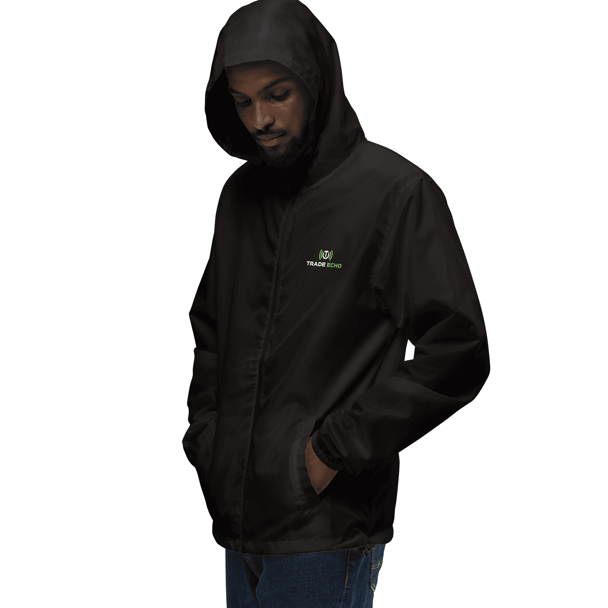 Model wearing the black Lightweight Windbreaker with the hood up and Trade Echo chest logo